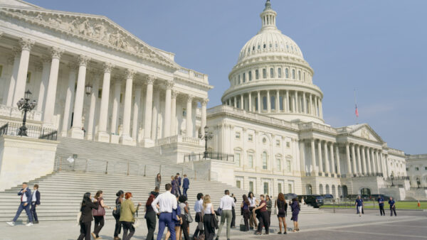 Youth advocates walk towards the US Capitol
